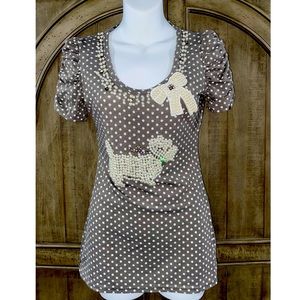 Gray and white poca-dot top with pearl and diamonds on it…poodle dog and bow